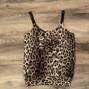 Studio Y animal print top with ruffle detail and fitted hem
